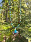 Turquoise stamped beaded necklace